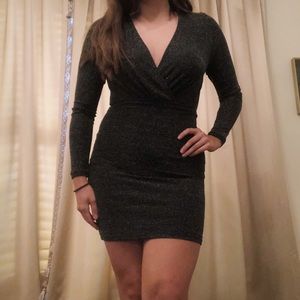 Black mini bodycon dress with long sleeves